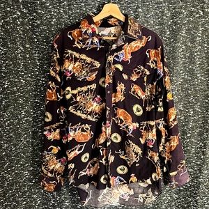 VINTAGE cowboy button down shirt. A very cool item to have in your closet!